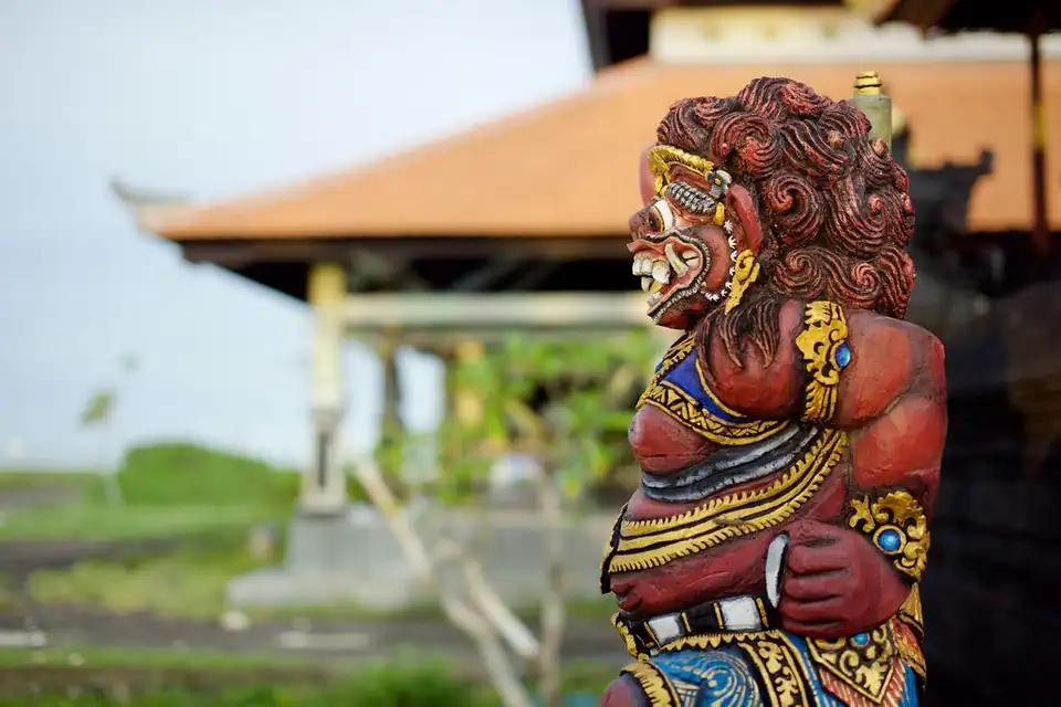 A guardian statue at the temple on the shore between Echo Beach and Old Man's