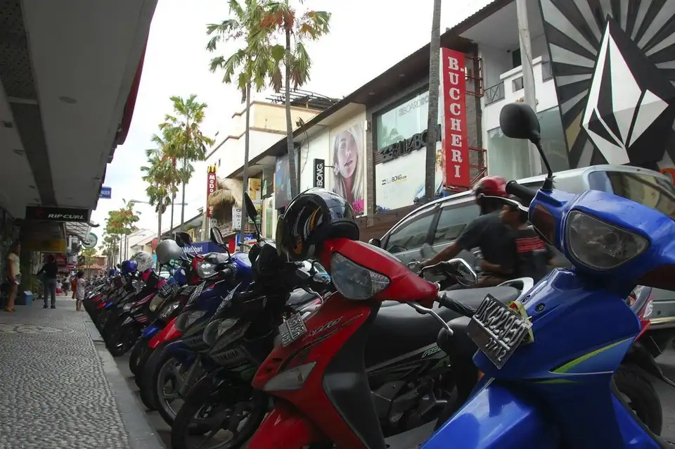 Scooters parked outside the surf shops on Kuta Square