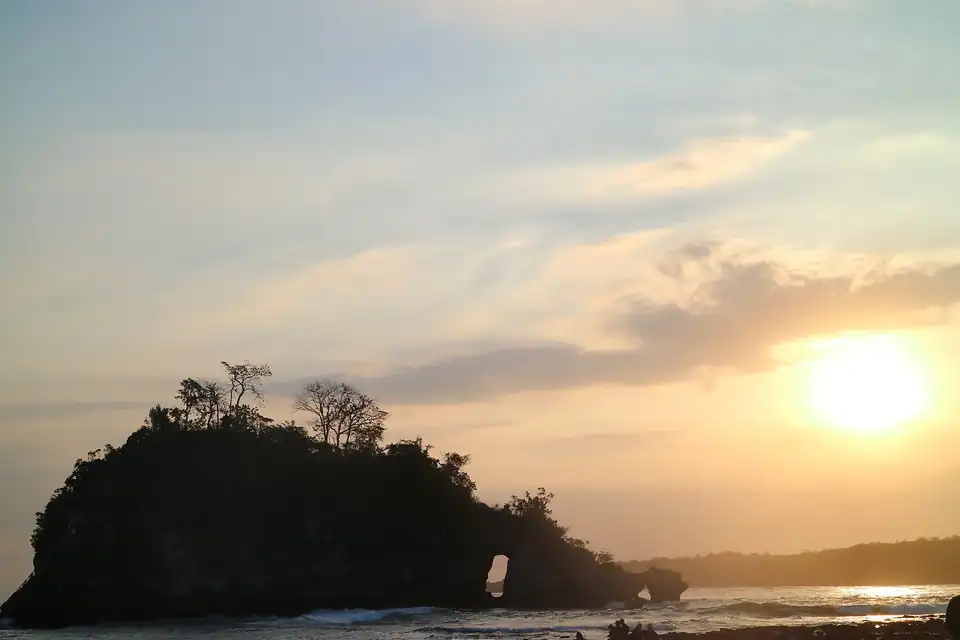 Sunset behind the islet at Crystal Bay