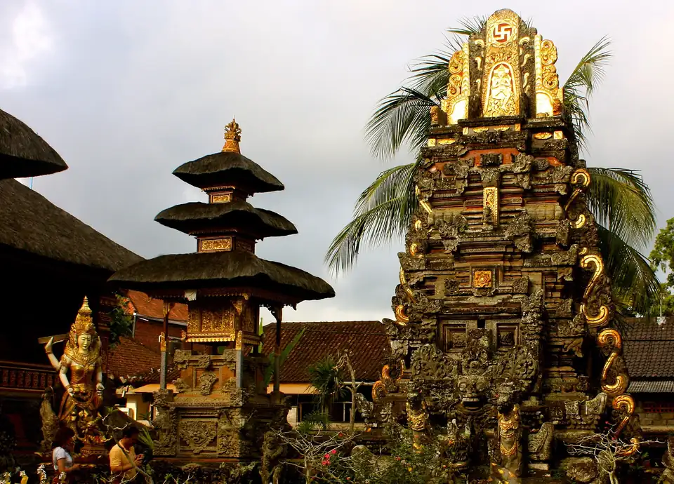 Carved and gilded shrines at Pura Taman Saraswati