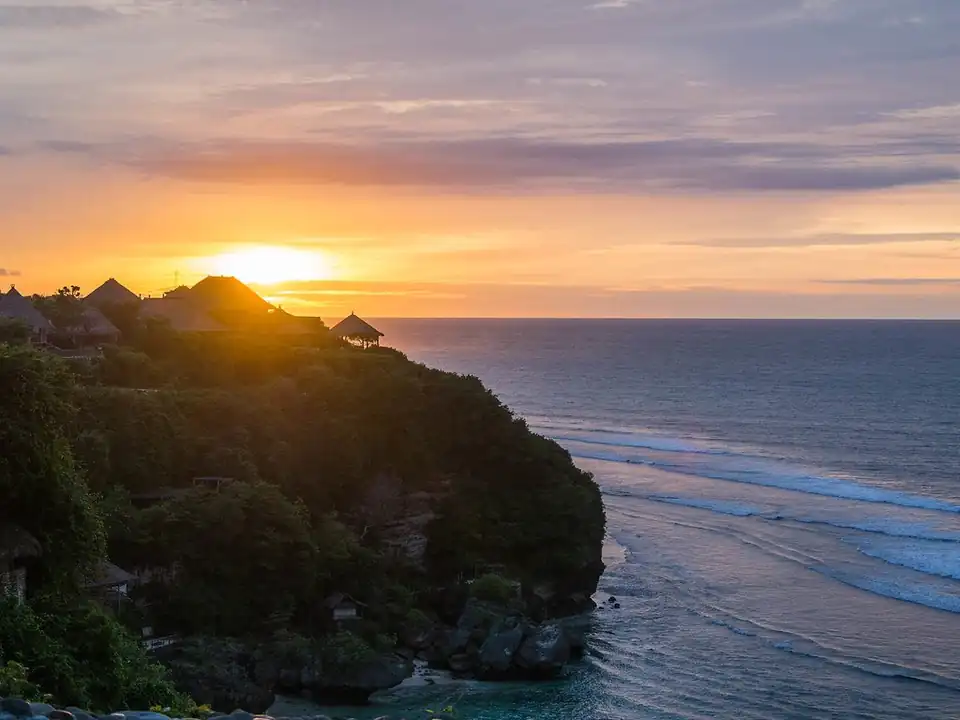 Sunset over the cliffs at Bingin