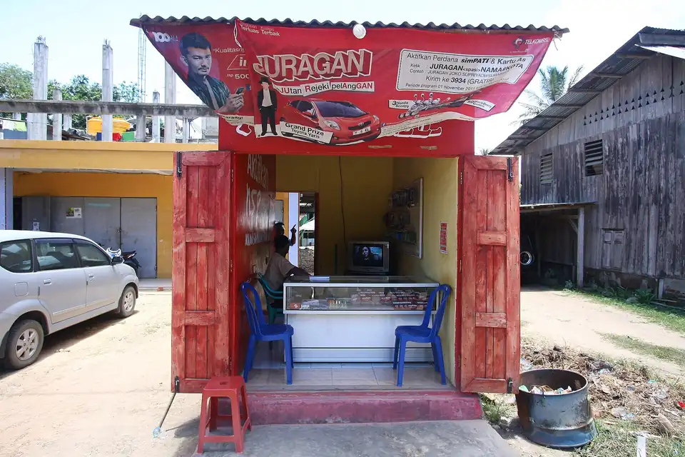 A roadside SIM card kiosk in Labuan Bajo, Indonesia