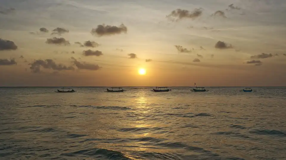 The calm beachfront at Sanur, a common first base for arrivals