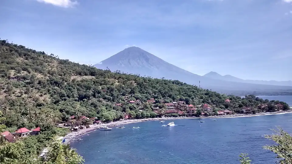 The bay at Bunutan near Amed with Mount Agung behind