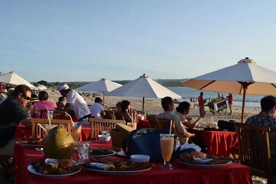 Seafood tables set on the sand along Jimbaran Bay