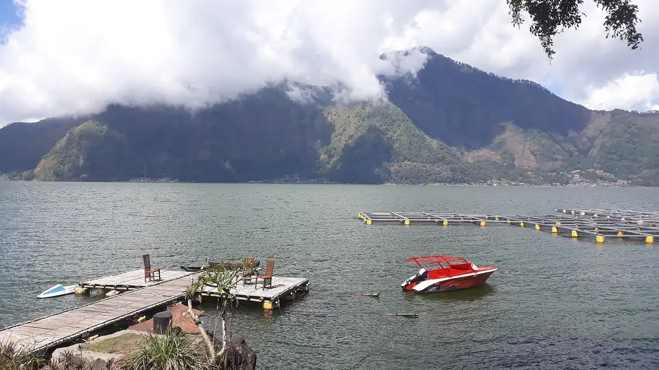 Boats moored on Lake Batur