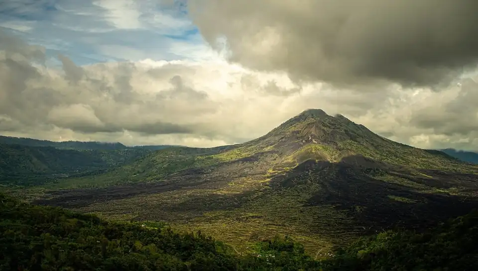 The cone of Mount Batur standing above its old lava field