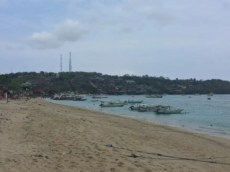 Boats moored off the beach at Nusa Lembongan